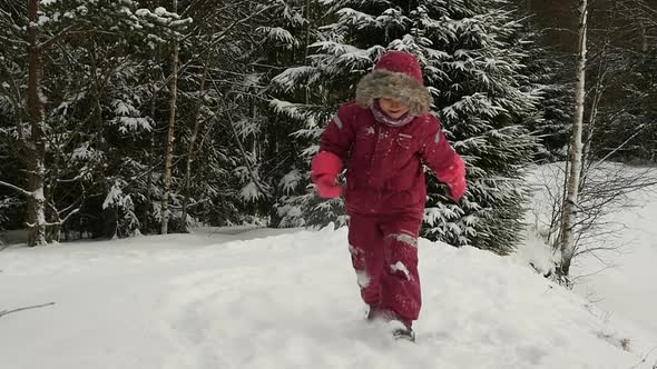 Cheerful Kid Running Through Deep Snow
