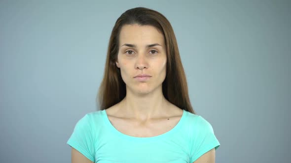 Stop Sign in Woman's Hands, Termination of Infringement of Women's Rights alt