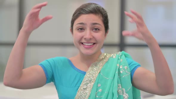 Portrait of Excited Indian Woman Celebrating Success alt