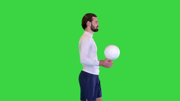 Soccer Player with a Bag in Hands Walking on a Green Screen Chroma Key alt