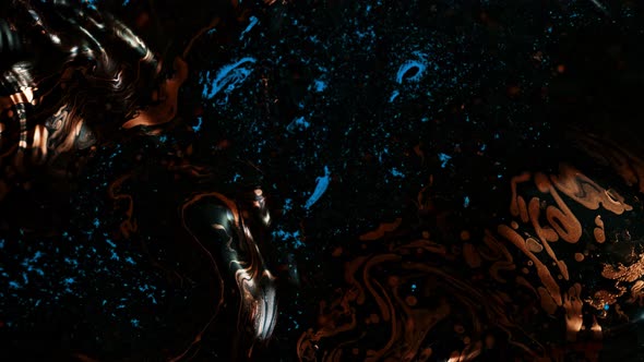 Super Slow Motion Shot of Dark Metallic and Water Background at 1000Fps alt