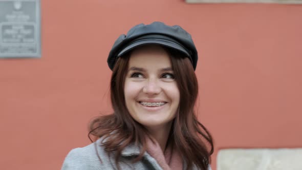 Young Woman With Dental Braces Smiling Happily.