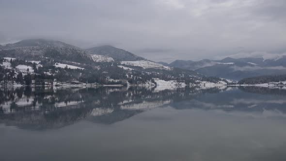 Mountains reflected in water alt