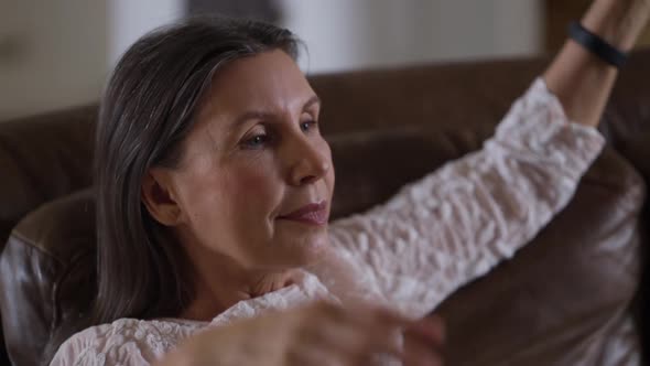 Serene Attractive Elderly Senior Woman Resting on Couch From Busy Day Spbi Healthy Calm Lady alt