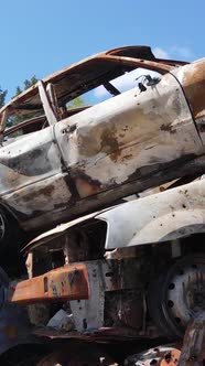 Vertical Video of Destroyed and Shot Cars in the City of Irpin Ukraine  the Consequences of the War alt