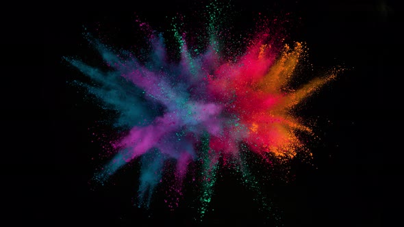 Super Slow Motion Shot of Color Powder Explosion Isolated on Black Background at 1000Fps. alt