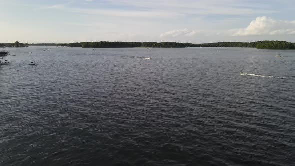 Two boats sailing at the lake aerial view alt