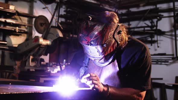Welder using welding torch alt