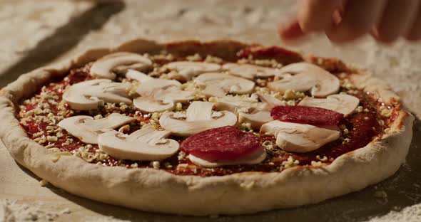 Experienced Cooker Making Pizza Using Traditional Recipe