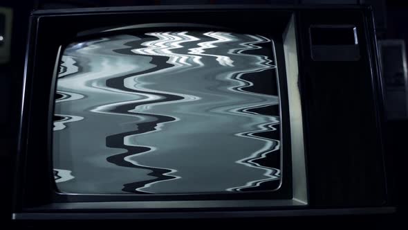 A Retro TV Turning On and Off Green Screen with Test Pattern. alt