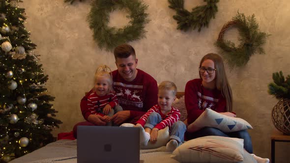 Happy Family Having Video Call on Christmas Day