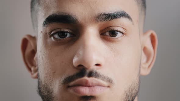 Closeup Portrait of Hispanic Indian Male Serious Young Student Man Freelancer Model Stand Indoor alt