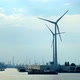 Wind Turbines in Antwerp Port on Sunset.
