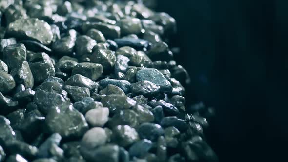 Slow Motion of Copper Ore Falling From the Transporter alt