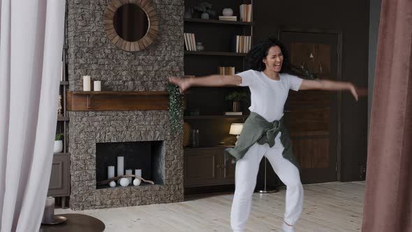 Happy Joyful Young Woman Dancing at Home Enjoying Freedom Weekend Alone Funny Girl Comedian Having alt