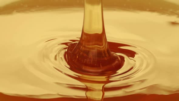 Golden Syrup Pours Closeup Shot alt