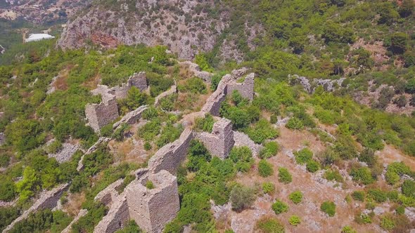 Top view of ancient ruins of castle on a hill alt