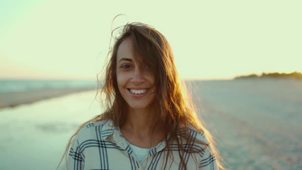 Outdoors Portrait of Happy Attractive Mixed Race Woman Enjoying Walk on Wild Sea Sand Beach at alt
