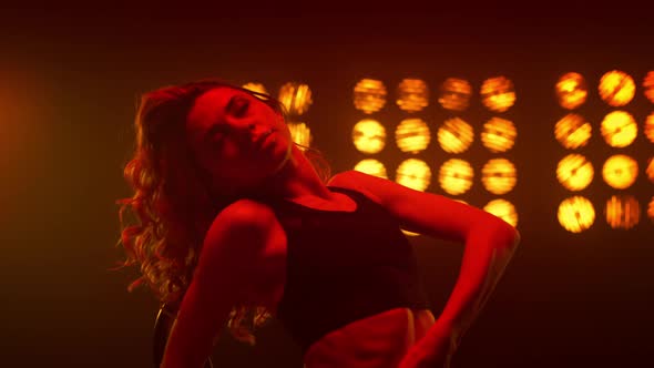 Portrait Lady Touching Body on Dancing Show alt