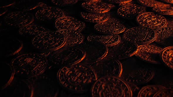 Candle Lights Up Old Treasure Coins alt
