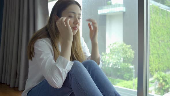 Depressed woman sitting alone with cuddle herself and Loneliness sad female think life problem  alt