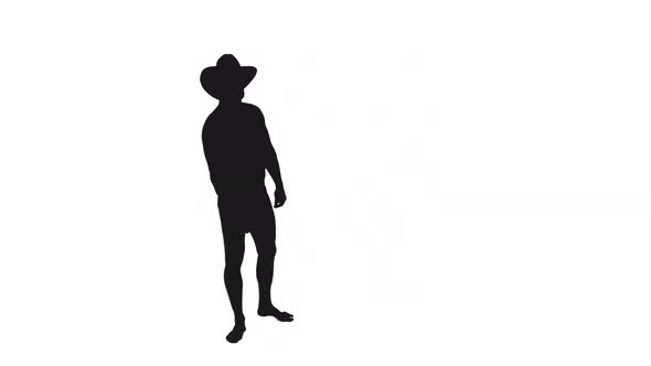 Silhouette Of Man In Cowboy Hat Waiting For Someone And Greeting