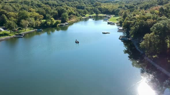 Fishing Boat on a Suburban American Lake Drone Areal View