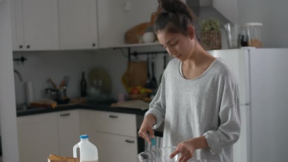 Pretty Young Woman Making Dough alt