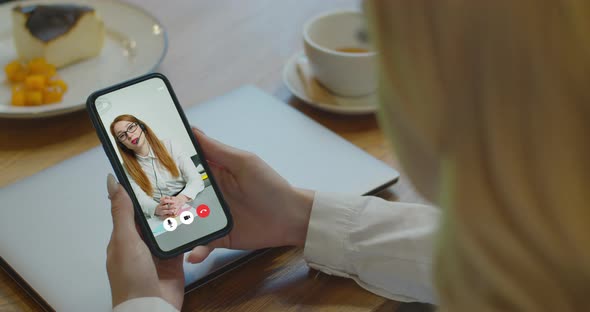 Young Student Watching Lesson Online and Studying From Cafe alt
