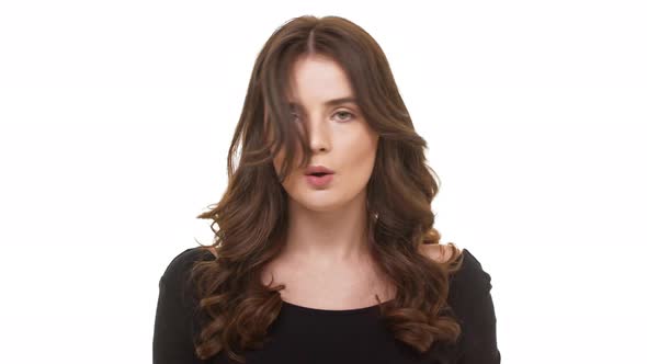 Strong Beautiful Caucasian Brunette Female Wagging Her Finger Warningly at Camera and Saying No alt