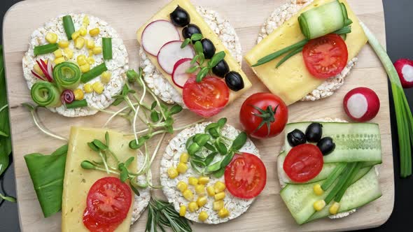 Vegetarian Fresh Sandwiches on a Wooden Cutting Board