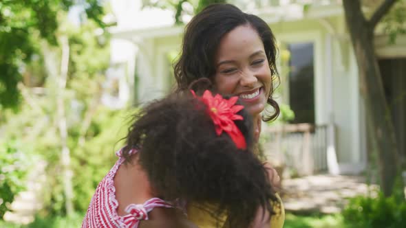 Portrait of an African American woman and her daughter  alt