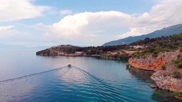 Aerial shot of Macedonia coast. Clif and beautiful water around Ohrid Lake in Southern Europe with v alt