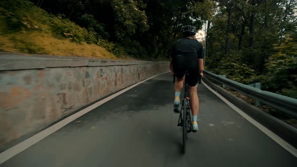 Bike Cycling.Cyclist Fitness Riding On Road Bike.Cyclist Triathlete Training Workout On Bicycle. alt