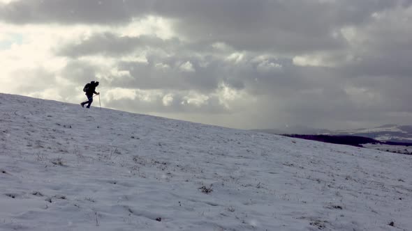 Snow Hiking In Blizzard Man alt