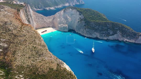 View of Navagio beach, Zakynthos Island, Greece. Aerial landscape. Blue sea water. alt