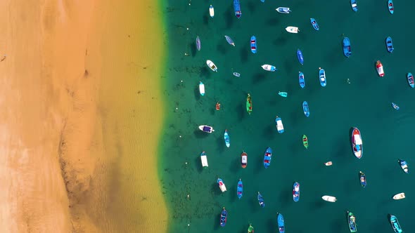 Aerial View of the Golden Sand of the Beach Las Teresitas and Colorful Boats Moored Alongside a alt