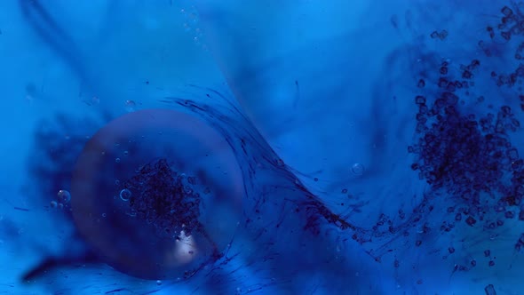 Movement Of Oily Blue Liquid In Water