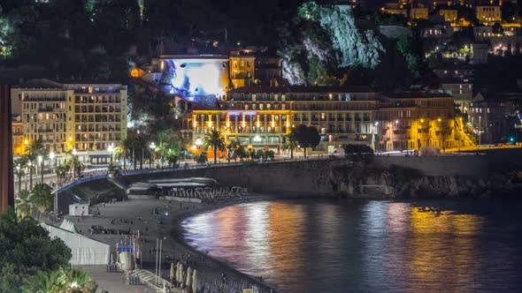 Night Aerial Panorama of Nice Timelapse, France. Lighted Old Town Little Streets and Waterfront alt