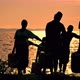 African Women Transporting Water Bottles at Sunset - VideoHive Item for Sale