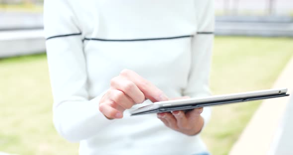 Woman Holding with Digital Tablet Computer alt