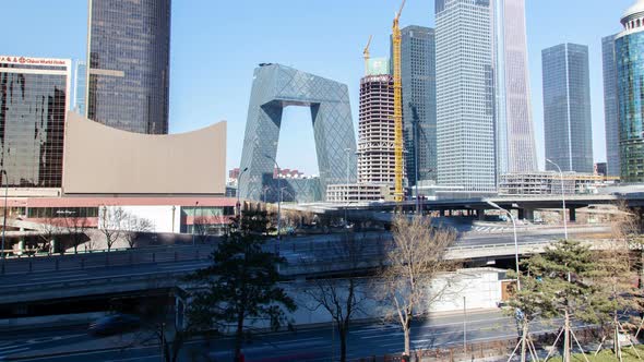 Beijing Business City Aerial Cityscape Panorama with Road Traffic China Timelapse Pan Up alt