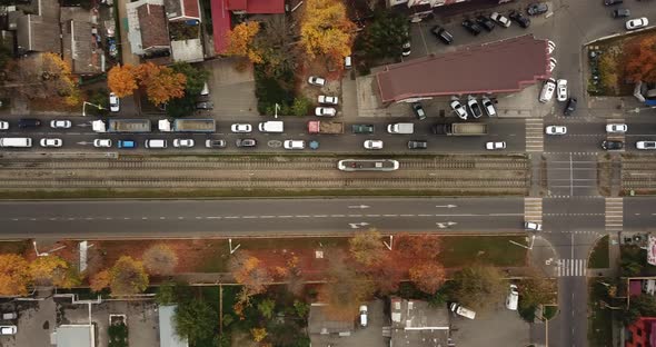 Top Down Drone Point of View - Steet City Road Intersection in Autumn Time alt