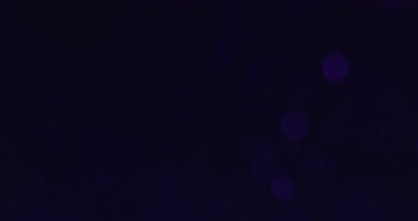 Purple Bubbles In Water Against Black Background alt