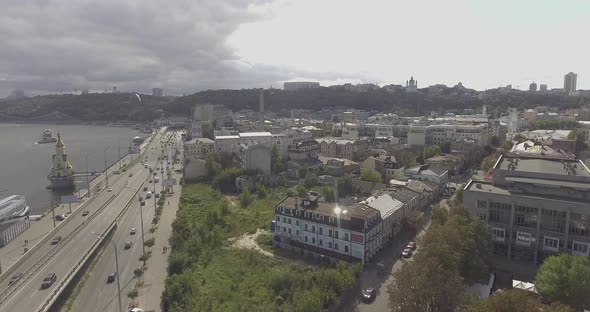 Old Kyiv in Europe, Kontraktova Square in Kyiv from a bird's eye view. Flight over the Dnieper River