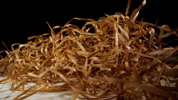 Pile of Artificial Hay of Paper Used As Filling for Parcels alt