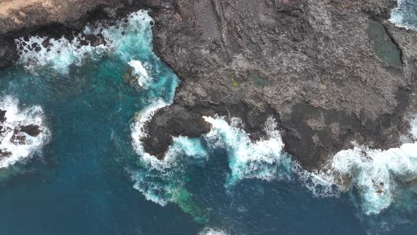 Rough Sea Water and Rocky Coastline alt