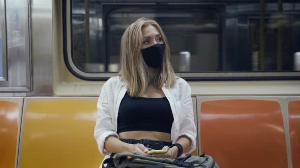 Woman in Subway Train