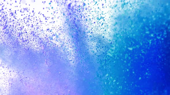 Super Slow Motion Shot of Color Powder Explosion Isolated on White Background at 1000Fps alt