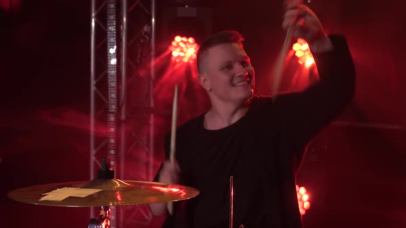 Musicians Play Piano Synthesizer Keyboard and Drums in Dark Studio with Smoke and Neon Lighting alt